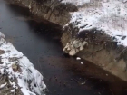 Черная река снова полилась с мусорного полигона в Новороссийске 