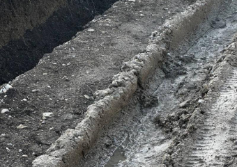 Дорога утонула после обустройства ливневки в Раевской